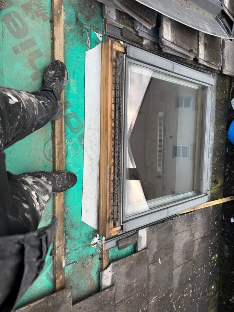 Rooflight and surrounding roof materials during repairs