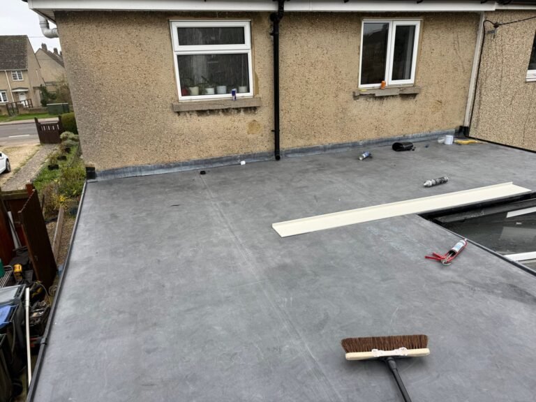 Flat roof membrane work on a house extension