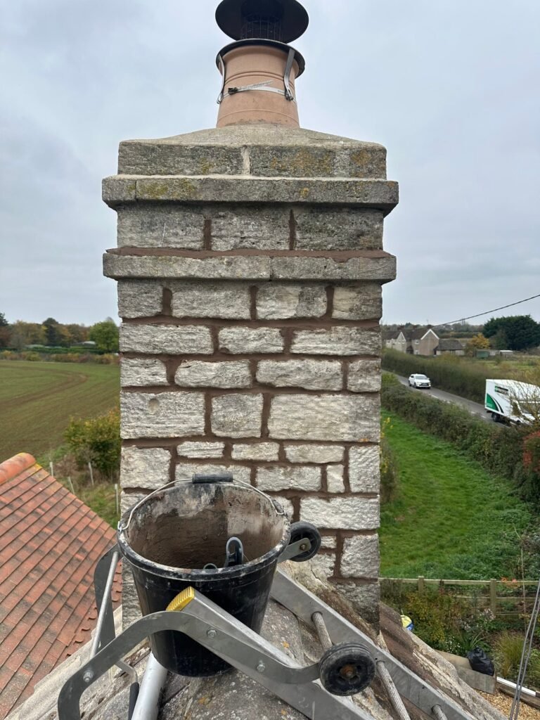 Brick chimney during masonry joint repairs