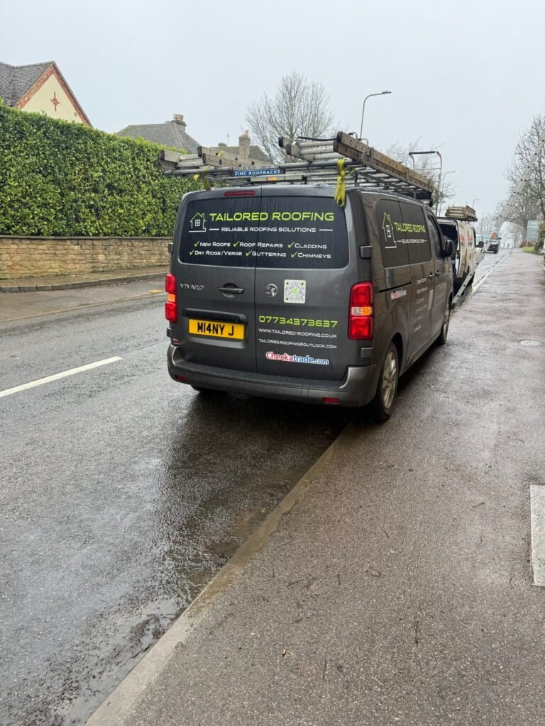 Tailored Roofing van beside a residential road